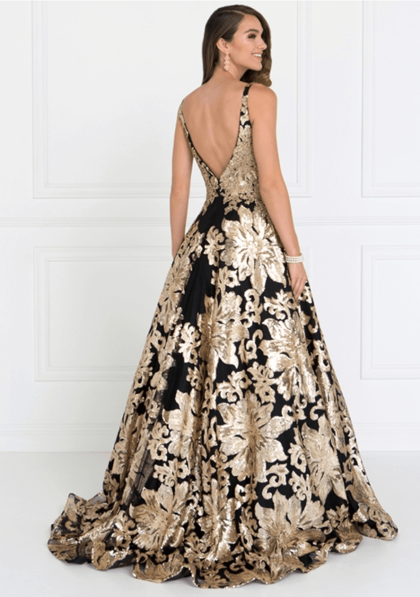 Gorgeous black and gold dress | Celebrity dresses, Celebrity inspired  dresses, Met gala dresses